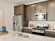 Close-up of kitchen island with stainless appliances and granite counters at 20802 E 66Th Ave, Aurora, CO 80019