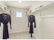 Spacious walk-in closet with ample shelving and hanging space for organized storage at 20802 E 66Th Ave, Aurora, CO 80019