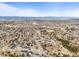 Expansive aerial view of a suburban community, showcasing mountain views and neighborhood layout at 650 Bishop Pine Way, Castle Rock, CO 80104