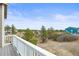Exterior view from balcony showcasing scenic green space and a tranquil setting at 650 Bishop Pine Way, Castle Rock, CO 80104