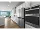 Bright, updated kitchen with stainless steel appliances and seamless access to living space at 650 Bishop Pine Way, Castle Rock, CO 80104