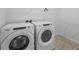 Convenient laundry room features modern washer and dryer set with ample space at 650 Bishop Pine Way, Castle Rock, CO 80104