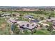 An aerial view of neighborhood homes showing solar panels and backyard patio at 10950 Elk Horn Run, Littleton, CO 80125