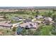 An aerial view of neighborhood homes showing solar panels and backyard patio at 10950 Elk Horn Run, Littleton, CO 80125