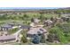 An aerial view of neighborhood homes showing solar panels and backyard patio at 10950 Elk Horn Run, Littleton, CO 80125