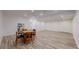 Finished basement area with game table, recessed lighting, and tile flooring at 10950 Elk Horn Run, Littleton, CO 80125