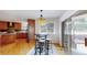 Cozy breakfast nook with backyard view and stylish modern table set at 10950 Elk Horn Run, Littleton, CO 80125