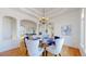 Bright dining room with a glass table and comfortable seating at 10950 Elk Horn Run, Littleton, CO 80125