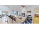 Cozy living room with fireplace, sliding doors to the balcony, and comfortable seating at 10950 Elk Horn Run, Littleton, CO 80125