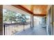 Spacious porch with mountain views offering a serene space for relaxation and outdoor enjoyment at 10950 Elk Horn Run, Littleton, CO 80125