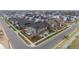 Aerial view of a well-planned community featuring neatly arranged homes, landscaped yards, and pedestrian-friendly streets at 6105 N Hanover St, Denver, CO 80238