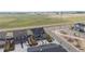 Aerial view of a residential area with modern homes and landscaped yards at 6105 N Hanover St, Denver, CO 80238