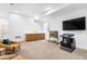 Spacious finished basement featuring a bar area, entertainment setup, and comfortable seating at 553 Monroe St, Denver, CO 80206