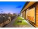 Expansive rooftop deck featuring a seating area, artificial grass, and outdoor games for fun and relaxation at 553 Monroe St, Denver, CO 80206