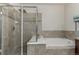 Bathroom with shower and soaking tub at 1488 Madison St # 505, Denver, CO 80206