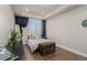 Bright bedroom with large window and hardwood floors at 1488 Madison St # 505, Denver, CO 80206