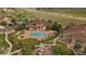 Beautiful aerial shot of the community clubhouse, swimming pool, and recreation area with manicured landscaping at 4474 Copeland Cir # 102, Highlands Ranch, CO 80126