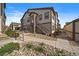 Attractive multi-Gathering home with neutral siding, landscaped with rocks and garden plants at 4474 Copeland Cir # 102, Highlands Ranch, CO 80126