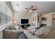 Inviting living space with comfortable gray sofas and a modern decorative theme at 4474 Copeland Cir # 102, Highlands Ranch, CO 80126