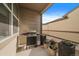 Outdoor patio with BBQ grill and potted plants, perfect for outdoor grilling and enjoyment at 4474 Copeland Cir # 102, Highlands Ranch, CO 80126