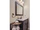 Bathroom featuring a modern vanity with stylish fixtures and storage space at 5603 Twilight Way, Parker, CO 80134
