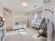 bedroom with whimsical decor, unique hanging chair, and lots of space at 5603 Twilight Way, Parker, CO 80134