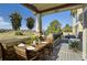 Inviting outdoor patio with dining and seating areas, with beautiful views and tasteful decor at 5603 Twilight Way, Parker, CO 80134