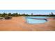 Large community swimming pool with lounge chairs and a spacious deck area at 5603 Twilight Way, Parker, CO 80134