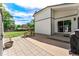 Backyard featuring a patio with picnic table, a lush green lawn, and convenient access to outdoor amenities at 17177 E Milan Cir, Aurora, CO 80013