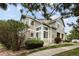Charming home exterior with lush landscaping, large windows, and stone accents at 805 Summer Hawk Dr # 100, Longmont, CO 80504