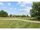Picturesque park with walking paths and mature trees offering a serene outdoor space at 805 Summer Hawk Dr # 100, Longmont, CO 80504