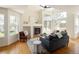 Inviting living room featuring a fireplace, hardwood floors, and plenty of natural light at 805 Summer Hawk Dr # 100, Longmont, CO 80504