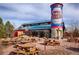 Oskar Blues Brewery and Restaurant with ample outdoor seating and silo with logo, great for enjoying the Colorado weather at 805 Summer Hawk Dr # 100, Longmont, CO 80504