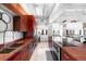 Modern kitchen provides a great layout with stainless appliances and stunning cityscape views at 100 Park W Ave # 2008, Denver, CO 80205