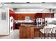 Modern kitchen with wood and granite countertops at 100 Park W Ave # 2008, Denver, CO 80205