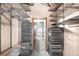 Spacious walk-in closet with ample shelving and drawers at 100 Park W Ave # 2008, Denver, CO 80205