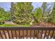 View from the deck highlighting the well-maintained backyard and path at 1209 S Flower Cir # C, Lakewood, CO 80232