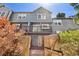 Charming townhouse with a private balcony and fenced backyard, perfect for outdoor relaxation at 1209 S Flower Cir # C, Lakewood, CO 80232