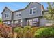 Back exterior of home featuring a wood deck and fenced backyard at 1209 S Flower Cir # C, Lakewood, CO 80232