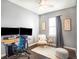 Bright office space complete with dual monitors, chair, and decor at 2773 Roslyn St, Denver, CO 80238