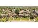 Residential neighborhood aerial view near Sloan's Lake featuring tree-lined streets and well-maintained lawns at 5044 W Moncrieff Pl, Denver, CO 80212