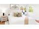 Cozy bedroom with ample natural light and stylish decor at 5044 W Moncrieff Pl, Denver, CO 80212