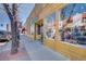 Charming storefront with bright windows, showcasing boutique clothing and jewelry at 5044 W Moncrieff Pl, Denver, CO 80212