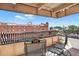 Cozy balcony with wrought iron railing and views of the surrounding neighborhood at 1365 Columbine St # 403, Denver, CO 80206