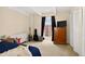 Bright bedroom with a large window, ample closet space, and neutral carpeting at 1365 Columbine St # 403, Denver, CO 80206