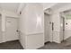 Hallway with elevator and apartment entrance, featuring neutral colors and classic design at 1365 Columbine St # 403, Denver, CO 80206