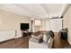 Inviting living room featuring hardwood floors, neutral paint, and a comfortable sofa at 1365 Columbine St # 403, Denver, CO 80206