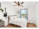 Bright bedroom with a window and a comfortable bed, offering a relaxing space at 4534 Nepal St, Denver, CO 80249