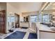 Large bathroom with soaking tub, walk-in shower, and vanity with illuminated mirror at 2981 Rock Cir, Elizabeth, CO 80107