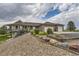 Spacious brick home with a three-car garage and landscaped front yard at 2981 Rock Cir, Elizabeth, CO 80107